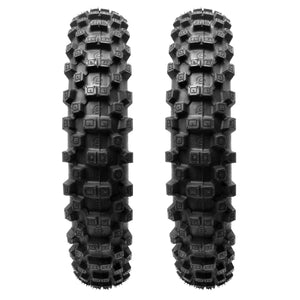 Two Plews black off-road dirt bike tires with tread patterns on a white background