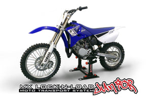 Lock-N-Load JUNIOR Strapless Motocross Transport System by Risk Racing - holding Yamaha dirtbike